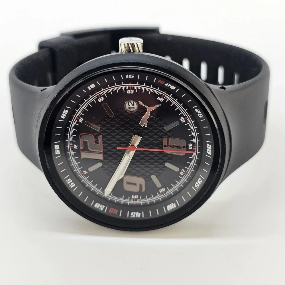 Puma Slick Men's Watch 45MM Black Dial Date Black Plastic Bands New Battery